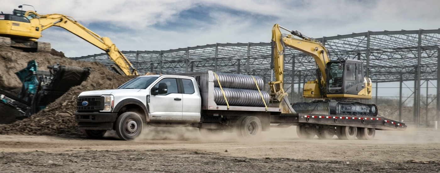 White 2025 Ford F-350 Chasis Cab on a construction site